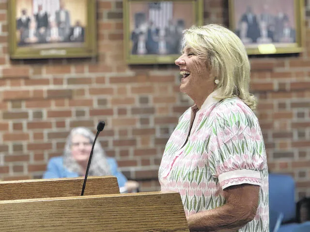 Downtown promotions committee member Debbie Roberts chuckles at a question from Councilman Joel Rose who inquired when tickets would go on sale for the Low Country Boil set for September.
                                 Dylan Atwood | Sampson Independent