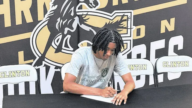 Taelyn Moore signs with the University of Mount Olive to continue his basketball journey.
Trevon McGlne | Sampson Independent