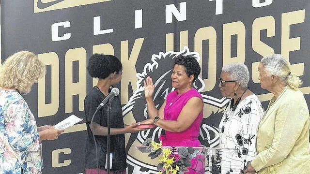 Carol Worley, current vice chairwoman of the Clinton City Board of Education, is sworn in for another term by Sampson County Assistant Clerk of Court Tammy Cashwell.
Trevon McGlone | Sampson Independent