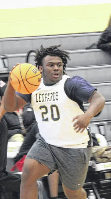 Lakewood grad Xavier Carr pushes the fast break.