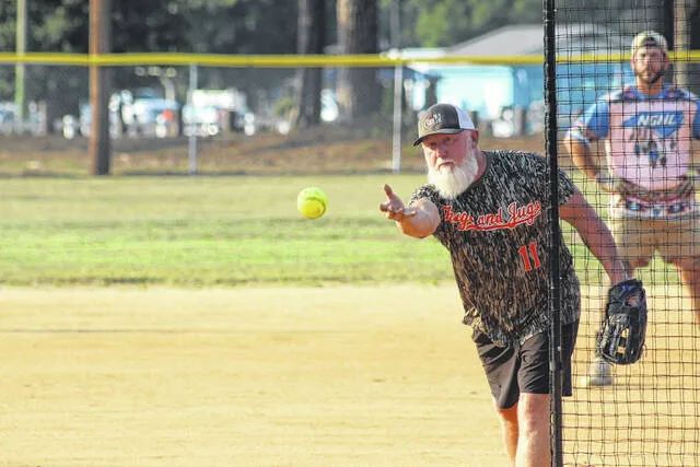 Bat and Boujees Russell Hope pitches in the game versus NGNL in Week 3 of the Clinton Recreation and Parks Adult Coed Softball League last Thursday at Royal Lane Park.
Trevon McGlone | Sampson Independent