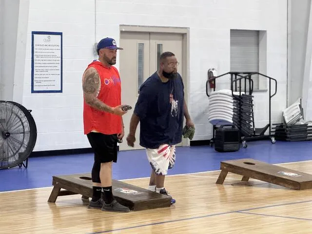 Justin Carter and Alvin Herring participate in the Clinton Rec Departments cornhole competition during Saturdays Fourth of July festivities.
Dylan Atwood | Sampson Independent