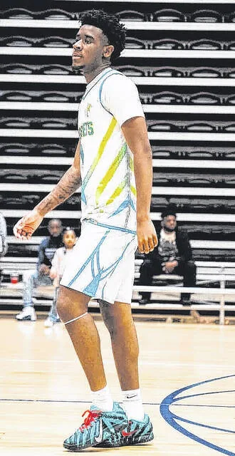 During the offseason, Richard Simpson continues to work on his craft playing for an AAU, the Harnett County Hornets.