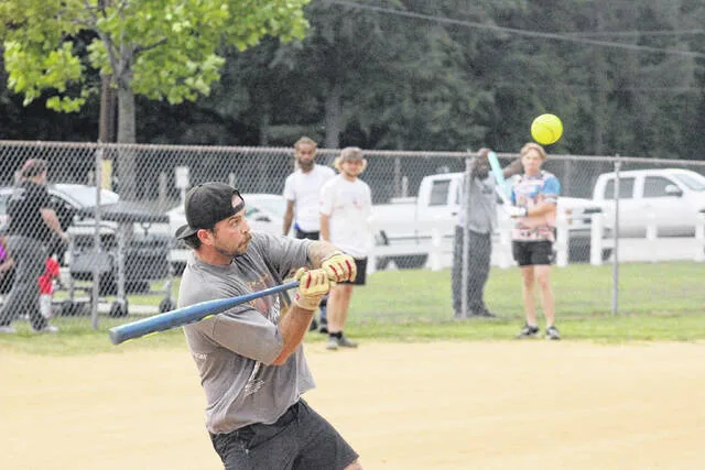 NGNLs Andrew Johnston swings to make contact with the ball in the bottom of the third inning of the game against Bat and Boujee Monday evening. Bat and Boujee defeated NGNL 18-15 in five innings.
Trevon McGlone | Sampson Independent