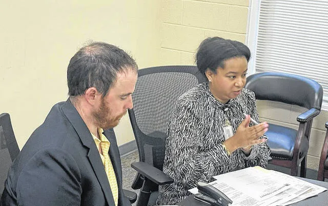 Sampson County Board of Elections Director Niya Raynor speaks to board members last week as Deputy Director Joe Johnson listens.
                                 Trevon McGlone | Sampson Independent