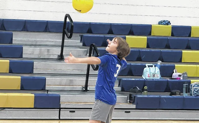Carter Spell prepares to return the volleyball during Clement Elementarys stop on the Sampson County Parks and Recreation Kids Summer Camp in June.
Carter Spell locates the volleyball as he prepares for the return hit.
Trevon McGlone | Sampson Independent