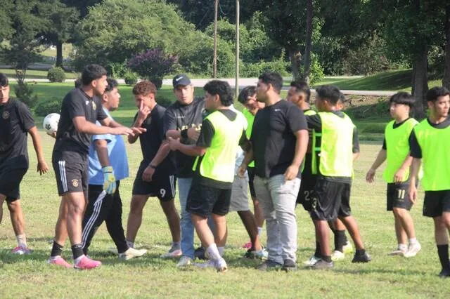 In the championship game, a heated debate forces the ref to seperate both United FC and Mi Arca. United FC won 3-2 to place first in the Grace Helping Others soccer tournament.
Trevon McGlone | Sampson Independent