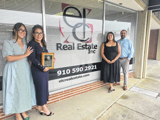 ELC Real Estate and its team were winners of multiple 2026 Readers Choice Awards, including Best Business in Sampson County. Here they are shown holding the Best Business plaque. From right, Chole Zeng, vice president; Georgina Zeng, president; Karen Hernandez, receptionist; and Richard Mitchell, real estate agent. Nearly 7,000 ballots were cast from across Sampson County during the two-week voting period for the Independents long-time competition, which included 100 categories. See the magazine honoring all the winners in todays paper.