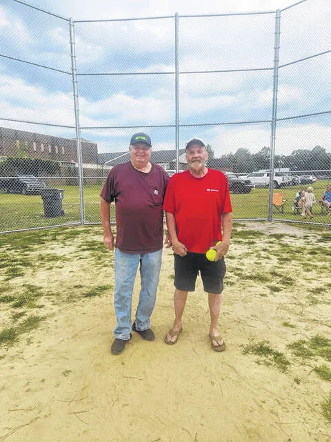 Raeford Mote coached softball for over 15 years in within the town of Garland, and he has earned a spot in the Southern Softball Association of America Hall of Fame. Pictured with him is Coleman Johnson.
                                 Courtesy Photo | Garland Softball League
