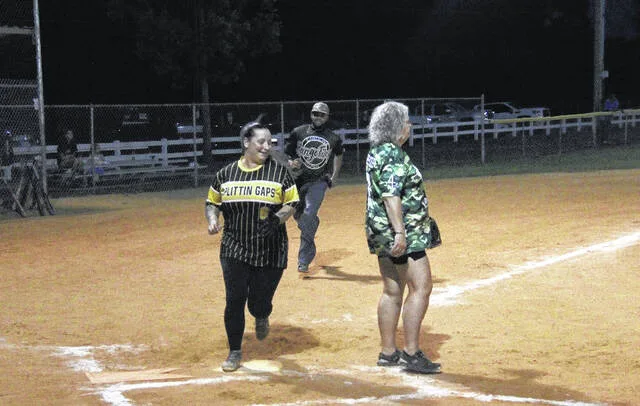 Splittin Gaps Karis Antigo and Jeffrey Jacobs make it home to extend their lead late in the fourth inning. The Gaps defeated Diamond Dynasty 21-8.
Trevon McGlone | Sampson Independent