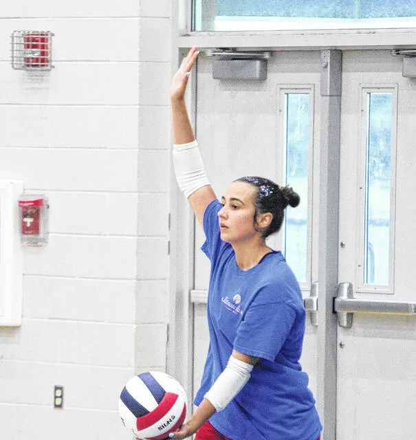 Midway junior Sarah Gary Bryan gets ready to serve
                                 Trevon McGlone | Sampson Independent