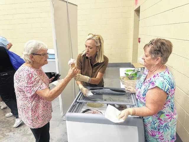 Michelle Pietrolaj and Lisa Tyndall serve scoops of ice cream at Wednesdays Senior Health Fair, with the line of seniors waiting for a cone staying long throughout the day.
Claire Fox | Sampson Independent