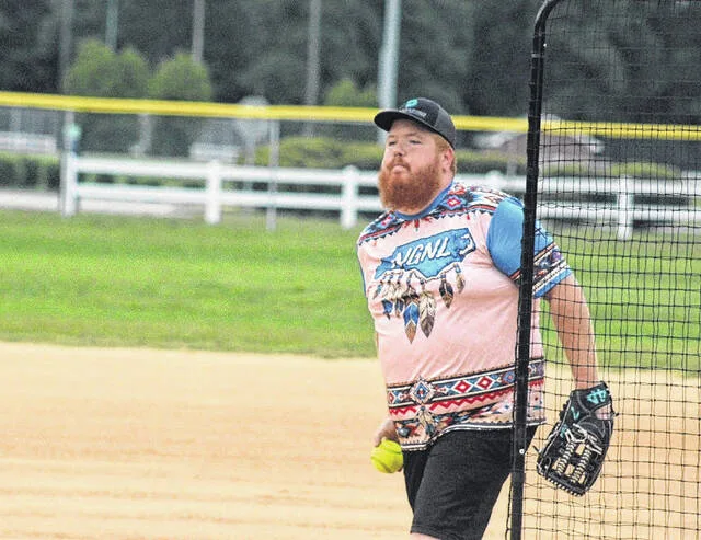 NGNLs Eric Stoddard winds up as he throws the pitch against Bad and Boujee. NGNL took the game in their playoff matchup 23-18.
Trevon McGlone | Sampson Independent