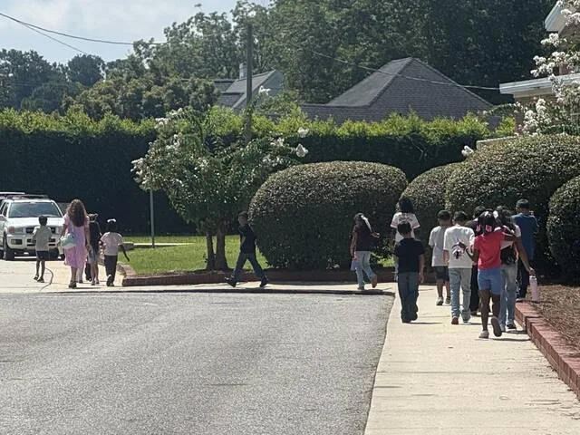 Sunset Elementary students step into the 2026-27 school year Monday as they head to the schools gym.