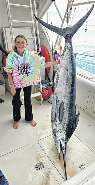 Pint-sized fisherpulls in 490-lb. prize