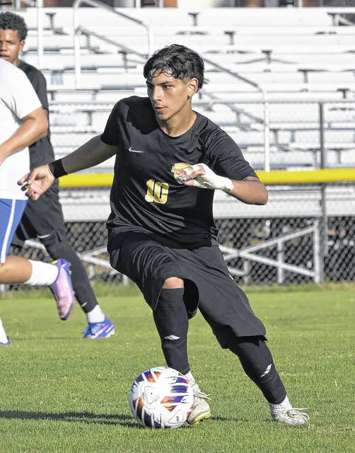 Hobbtons Daniel Espino makes his way toward the goal.
                                 David Johnson|Sampson Independent