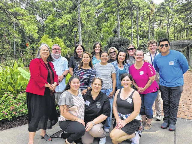 Lakewood High and Roseboro Elementary beginning teachers and their mentors started the 2026-27 school year differently Rooted for Success. With the help of a Simple Gifts grant they had a workshop at Cape Fear Botanical Gardens before the start of the school year, where they learned strategies for success in the classroom. Pictured are LHS teachers with Rebecca Byerly, founder of Mentally Engaged Minds, who spoke on student engagement and instructional excellence during the workshop.