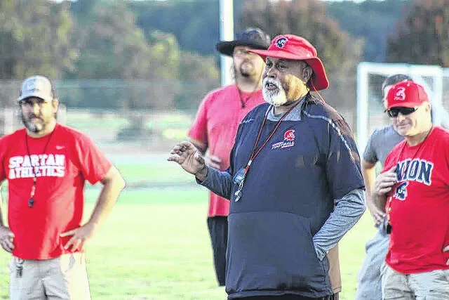 Union varsity football head coach Mark Oates speaks to recreation kids at Unions football camp hosted at the high school on Wednesday evening.
                                 Courtesy Photo | Sampson Parks and Recreation