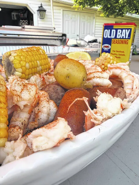 The Low Country Boils head chef, Tim Walters, cooked up potatoes, shrimp, corn, and sausage two weeks ago for a group gathered to	sample the country boils menu. Walters is an employee of Prestage Farms and maintains his own catering team, Killing Time Grilling Crew. Walters team at the Low Country Boil on Sept. 20 will include Mark Pearson, Jason Barefoot, and Michael Buchanan.
                                 Courtesy photo | Tyler Wise