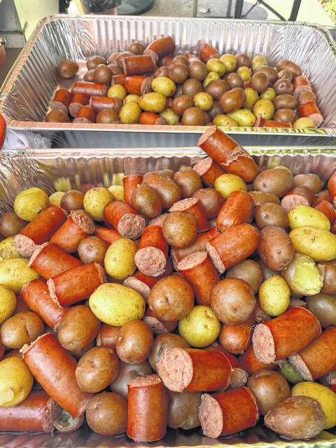 Sausage and potatoes are cooked together by Tim Walters at a tasting two weeks ago. Walters will prepare the potatoes and sausage again for the Low Country Boil on Sept. 20 as the head chef.
                                 Courtesy photo | Tyler Wise