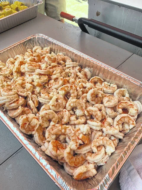 Tim Walters, the Low Country Boils head chef, has the shrimp prepared during a preview tasting two weeks ago. Walters will be handling the shrimp again on Sept. 20 when the country boil takes place.
                                 Courtesy photo | Tyler Wise