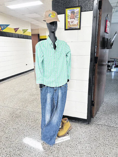 The career of the month is highlighted outside Katrina Boykins Career and Technical Education classroom with a mannequin dressed in the uniform of the career.
                                 Claire Fox | Sampson Independent