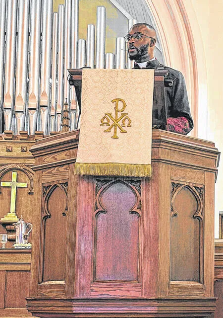 The Rev. Justin Wade from First Baptist Church, 900 College St., gave the sermon titled What To Remember When We Remember, Friday, urging the community to remember the hope of God in the midst of tragedy as part of the 9/11 Communion Service of Rembrance at Graves Memorial Presbyterian Church.
                                 Photos by Claire Fox | Sampson Independent