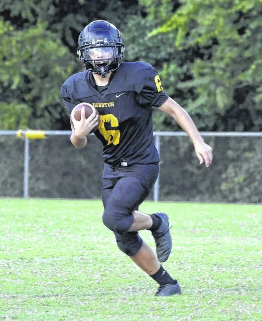 Freshman Wildcat Julian Pope-Flores eyes a lane on the sideline as he darts up the field during a game Thursday.