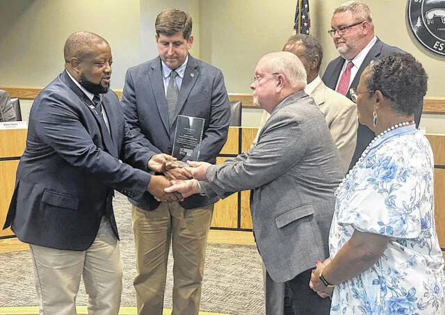 Sampsons Board of Commissioners receive the NCACC award for its support and partnership with the NC State Cooperative Extension at Monday nights meeting.
