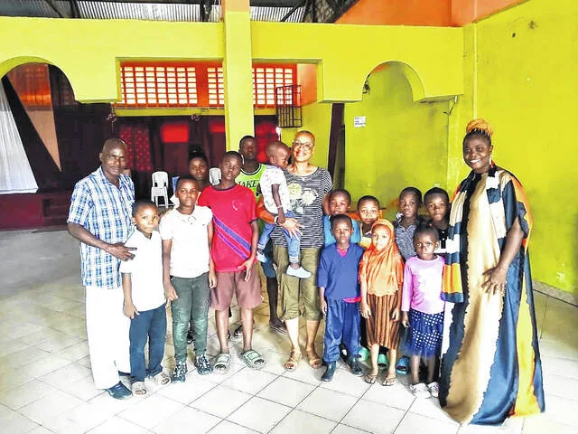 Rhonda Barnes, pictured in the center, is a former educator who travels to Mombasa with Jacqueline Howard after becoming excited about Mombasa Relief Initiatives goal of raising support for children who do not have access to free education. Barnes wanted to go on this trip in honor of her deceased grandson Dominic, who died on July 29, 2015; he would be 11 years old this year. With the help of family and friends, Barnes was able to provide support for more than 11 children and families in honor of him.
                                 Courtesy photo | Jacqueline Howard
