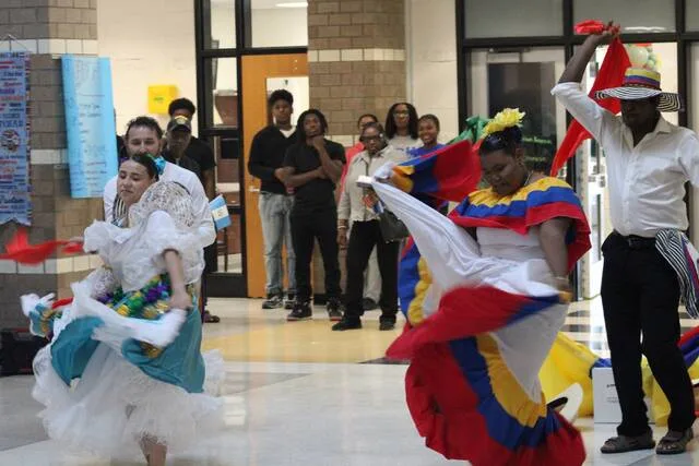 A local Colombian group, showing some of their cultural dances, performed during Fridays multicultuarl event at Clinton High.