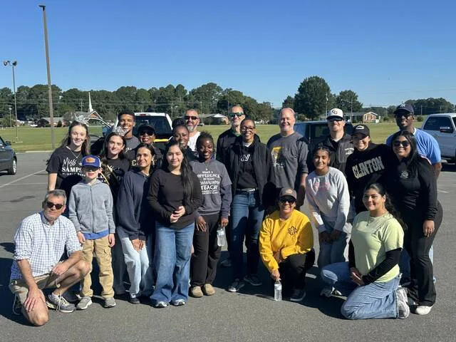Students, staff, administration, and members of the community all came together Saturday at Sampson Middle to volunteer their efforts towards the Dark Horse Food Drive.