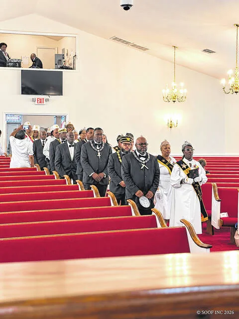 Members of Phoenix Lodge #77 and Julia Chapter #005 process into the sanctuary of Poplar Grove Missionary Baptist Church during the opening of their 46th Anniversary celebration in Faison.