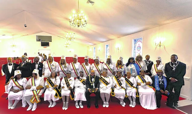 Members and leadership of Phoenix Lodge #77 and Julia Chapter #005 gather for a commemorative photograph following their 46th Anniversary celebration at Poplar Grove Missionary Baptist Church.